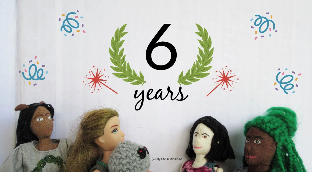 From left to right, Petra, Sarah, Chip the android, Tiffany, and Hazel stand in front of a white background. They are photographed from the shoulders up, and they all look up. Above them is a big white space filled with large black text saying '6 years'. Surrounding the text are graphics of a laurel wreath, sparklers, and little bursts of confetti.